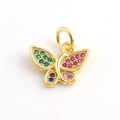 Macro view of a gold butterfly charm with colorful zircon stones and polished finish - Pavé Multicolored Gemstone Butterfly Pendant (15)
