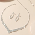 Silver teardrop rhinestone necklace and earring set with shimmering crystal mesh detail - V-Shaped Mesh Necklace Earring Set (DTN14026319S)