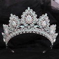 Detailed macro view of baroque silver bridal tiara with light blue opal gems and rhinestones - Silver White Rhinestone + Green Opal