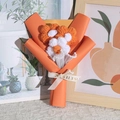 Handmade knitted mini bouquet with orange crochet flowers and pearl mesh wrap - Orange