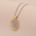 Detail of two-tone necklace with letter J pendant and micro-paved crystal border - Letter J