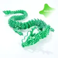 Macro shot of 3D printed Pearl Green articulating dragon showing flexible joints and silk texture - 30CM Pearl Green