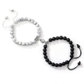 Detail of natural stone magnetic couple bracelets with white turquoise and black agate beads - Howlite & Black Matte Round Magnet Buckle