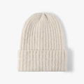 Thick ribbed knit beanie hat in cream beige featuring a foldable cuff design - Beige