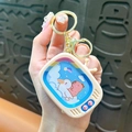 Miniature beige TV handheld game console keychain with cute animal illustrations and golden clip - Sliding Game Console - Blue