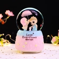 Rotating crystal ball music box with pastel gradient base and cute cartoon couple - -035 Pink Base / Large 100mm Snow + Light