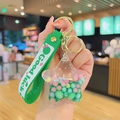 Star-shaped liquid acrylic keychain with green macaron beads and Good Luck wrist strap - Green Quicksand Series-Star
