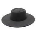 Detail of a vintage black wool felt flat top wide brim hat with a smooth matte finish - Dark Gray