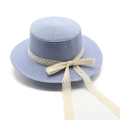 Detail of light blue straw boater hat featuring elegant cream lace ribbon and bow - M (56-58cm) / Sky Blue