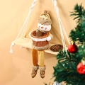 Festive Christmas snowman fruit storage basket decoration sitting on a hanging shelf - Snowman