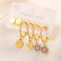 Detail of 18K gold plated stainless steel earring set with enamel charms on white silk - 3 Pairs Bohemia Disk Set