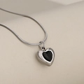 Minimalist silver snake chain necklace featuring a black heart-shaped zircon pendant - Silver + Black Zirconia