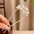 Épingle à cheveux en U dorée avec feuilles et perles blanches goutte au style vintage - Épi de Blé en Strass en Forme de U / Or
