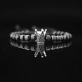 Close-up of vintage titanium steel crown charm bracelet with black stones and knurled beads - Black Crown with Black Zircon