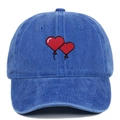 Detailed view of red heart balloon embroidery on washed cotton baseball cap in blue - Adjustable / Sapphire Blue