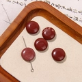 Five round reddish-brown jasper beads in a wooden tray for jewelry making - Reddish Brown Ore Round Style (48号)