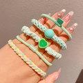 Mint green high elasticity hair ties set for girls including woven and heart charm styles - Green System