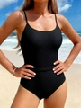 Detail of black one-piece swimsuit featuring ribbed texture and woven waist design - S / Black
