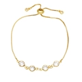 Detail of adjustable gold bolo bracelet featuring sparkling round-cut clear zircons - White