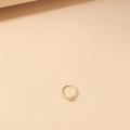 Elegante vergulde roestvrijstalen ring met een fijn hartvormig detail van zirkoniasteen - Hart Ring / Goud