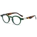Classic green round sunglasses with tortoiseshell temples shown at 45-degree angle - Green Frame Clear Lens