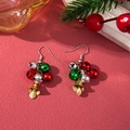 Festive Christmas bell earrings with colorful alloy clusters on a red textured surface - D1302 (Colorful Bells)