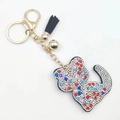 Cute cartoon crystal cat keychain with blue rhinestones and black fringe tassel charm - Multi-color