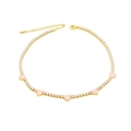 Detailed macro of gold-plated choker with pink heart charms and zircon crystals - Pink Heart: White Zircon