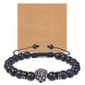 Macro shot of black matte beaded bracelet with lion head charm and gift card for boyfriend - To My Amazing Boyfriend