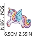 Colorful embroidered unicorn patch with wings and meteor shower details on white background - Flying Unicorn
