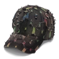 Detailed close-up of distressed denim baseball cap with colorful rainbow webbing under holes - Black