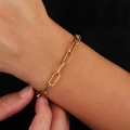 Minimalist 18K gold plated stainless steel paperclip chain bracelet for women on black background - 4mm Paperclip Bracelet