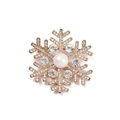 Macro shot of sparkling snowflake brooch with gold plating, rhinestones, and central pearl - Rhinestone Pearl