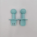 Light blue silicone baby fork and spoon set with panda handles and safety shields - Mint Green