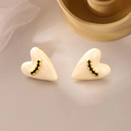 Elegant heart-shaped cream enamel stud earrings with gold trim and black crystal details - Heart Zirconia Studs / Beige
