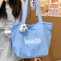 Light blue large capacity drawstring tote bag with plush rabbit pendant accessory - Blue with Rabbit Charm