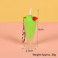 Cute green smoothie ice cream sundae keychain with strawberry and lemon charms - Green