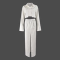Dettaglio del set due pezzi con camicia corta a righe e gonna con spacco alto - S / Bianco