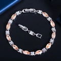 Modisches vergoldetes Armband mit champagnerfarbenem Zirkon und floralen Akzenten - Champagner