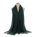 Close-up of deep green cashmere scarf fringe and soft fabric texture on a mannequin - Dark Green