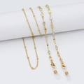 Elegante catena per occhiali dorata con strass brillanti e asole in silicone - Distanziatori Geometrici in Strass