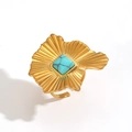 Golden ring featuring a square turquoise stone and irregular sunburst textured design - Turquoise Inlaid Radial Ring (TR60544-BL)