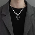 Silver titanium cross pendant necklace with pearls and rhinestones on female model neck - Cross Pearl Necklace X1248