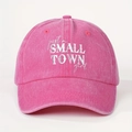 Pink washed cotton baseball cap with Small Town Girl slogan shown in front view - One Size / Rose Red