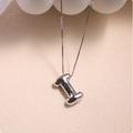 Close-up of polished silver letter I pendant on a durable box chain necklace - Silver (With Necklace) I