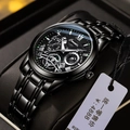 Close-up of black stainless steel hollow dial mechanical watch with luminous hands - Black Steel Black Face