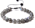 Adjustable woven bracelet featuring gray labradorite beads with blue flash and pull cord - Labradorite