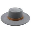 Detailed close-up of the grey wool felt flat top hat with brown leather band and gold stud - M (56-58cm) / Gray