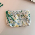 Detail of floral cotton mini pouch with green zipper cord and simple wish label - White with Blue Green Flowers