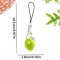 Green resin ocean conch pendant keychain with internal liquid and sea shell details - Transparent Green Resin Ocean Conch Bag Charm-ER1928